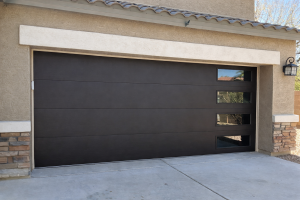 After photo of CHI modern garage door installed by MasterCraft in Arizona