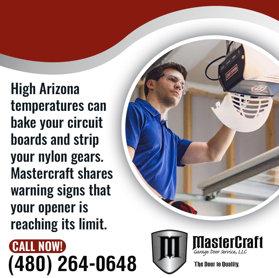 Technician inspecting a garage door opener motor and components